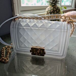 Elegant Clear Quilted Bag with Gold Accents